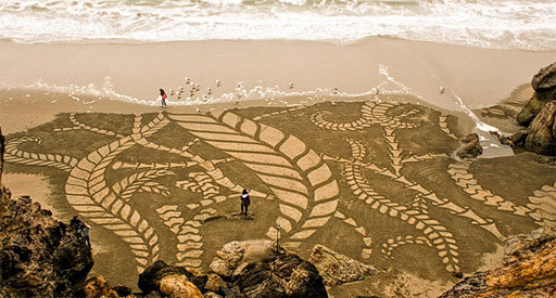 Dibujos efímeros en la playa